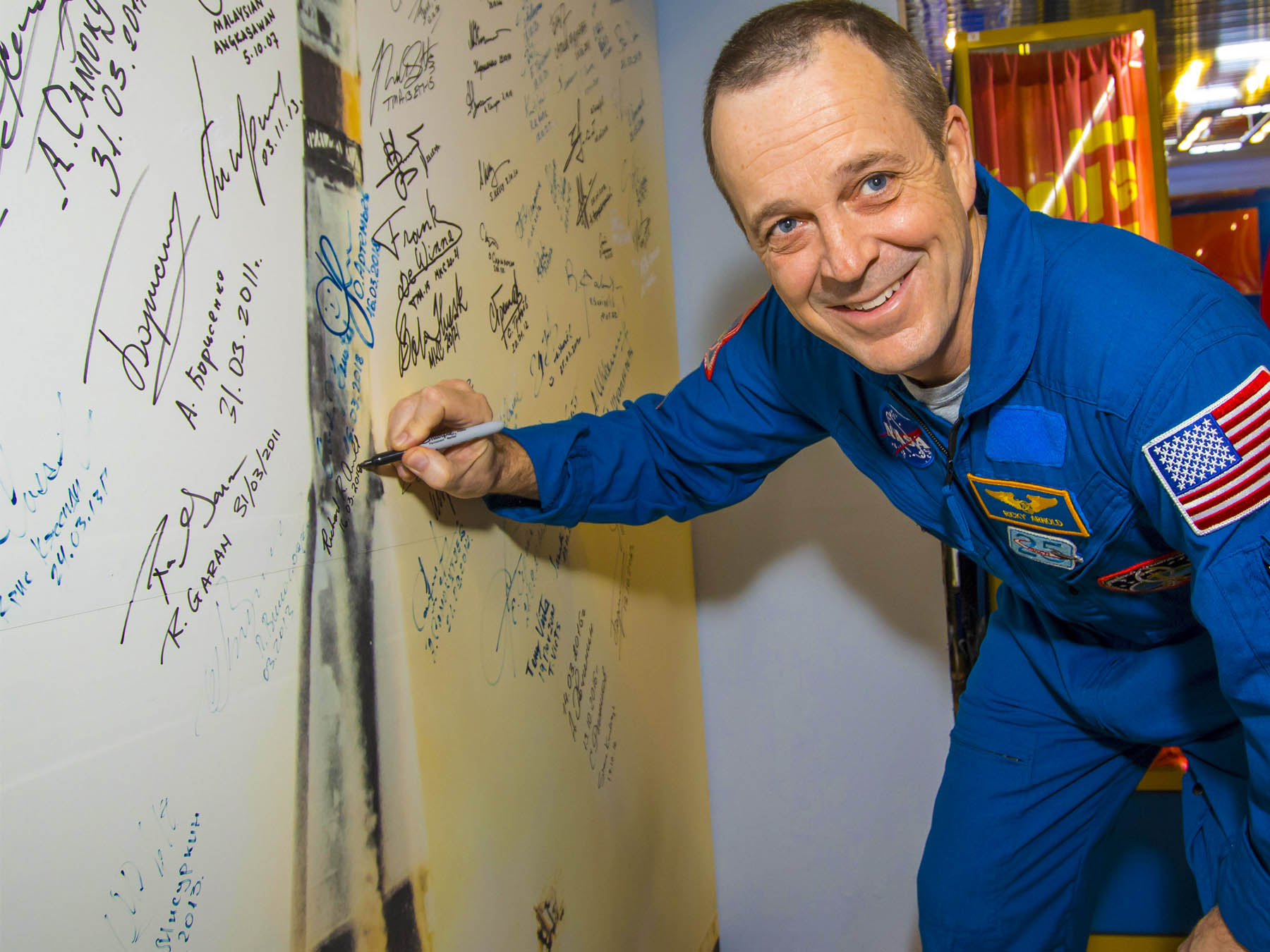 Ricky Arnold signing wall